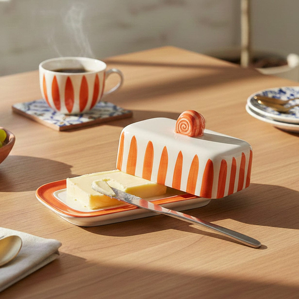 Beurrier en céramique rayé orange et blanc Beurrier rayé "Costa Nova Mar" - Orange
