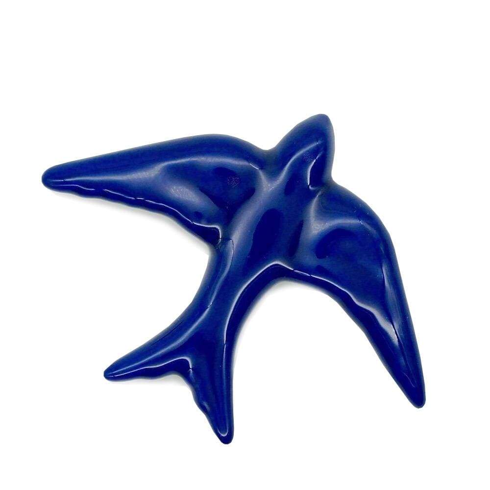 Hirondelle traditionnelle en céramique bleu cobalt
