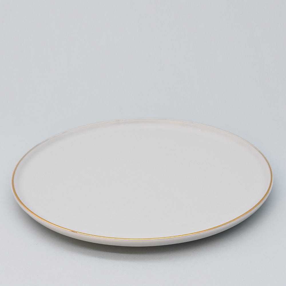 Assiette en porcelaine blanche à bord doré Ø27cm – Fabriquée au Portugal Assiette en porcelaine "Resonance" - 27cm