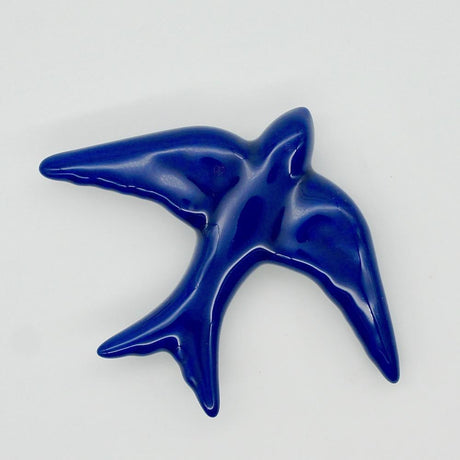 Hirondelle traditionnelle en céramique bleu cobalt