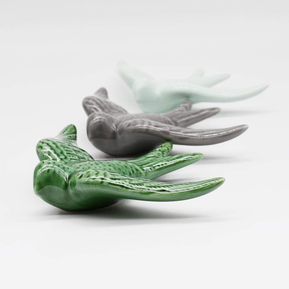 Hirondelle en céramique grise