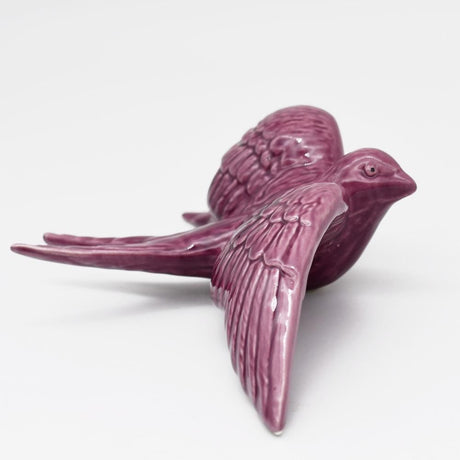 Hirondelle de Caldas da Rainha en céramique mauve