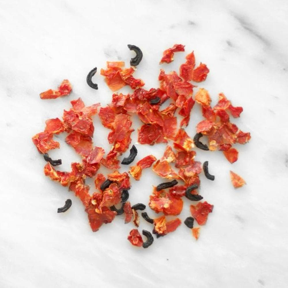 Tube of dehydrated Tomatoes and Black Olives